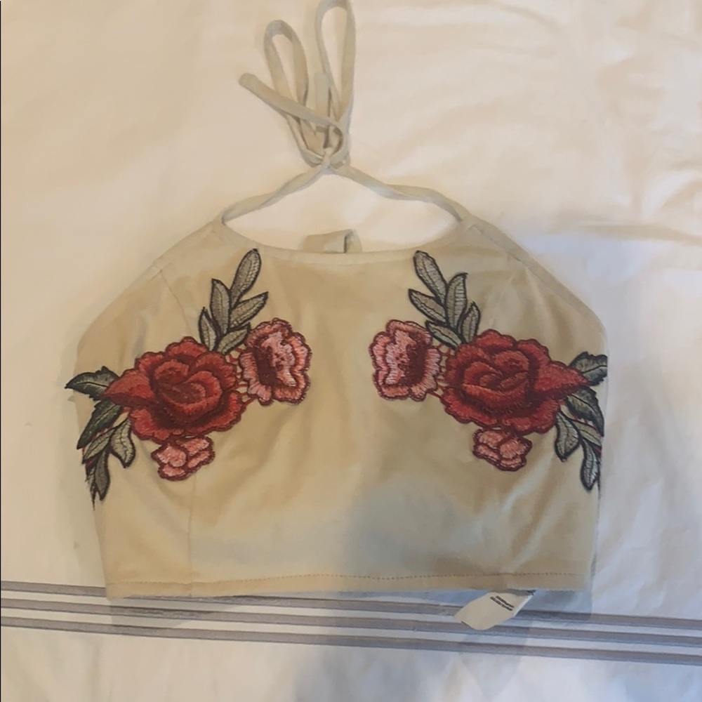Cream halter top with floral design. Barely worn